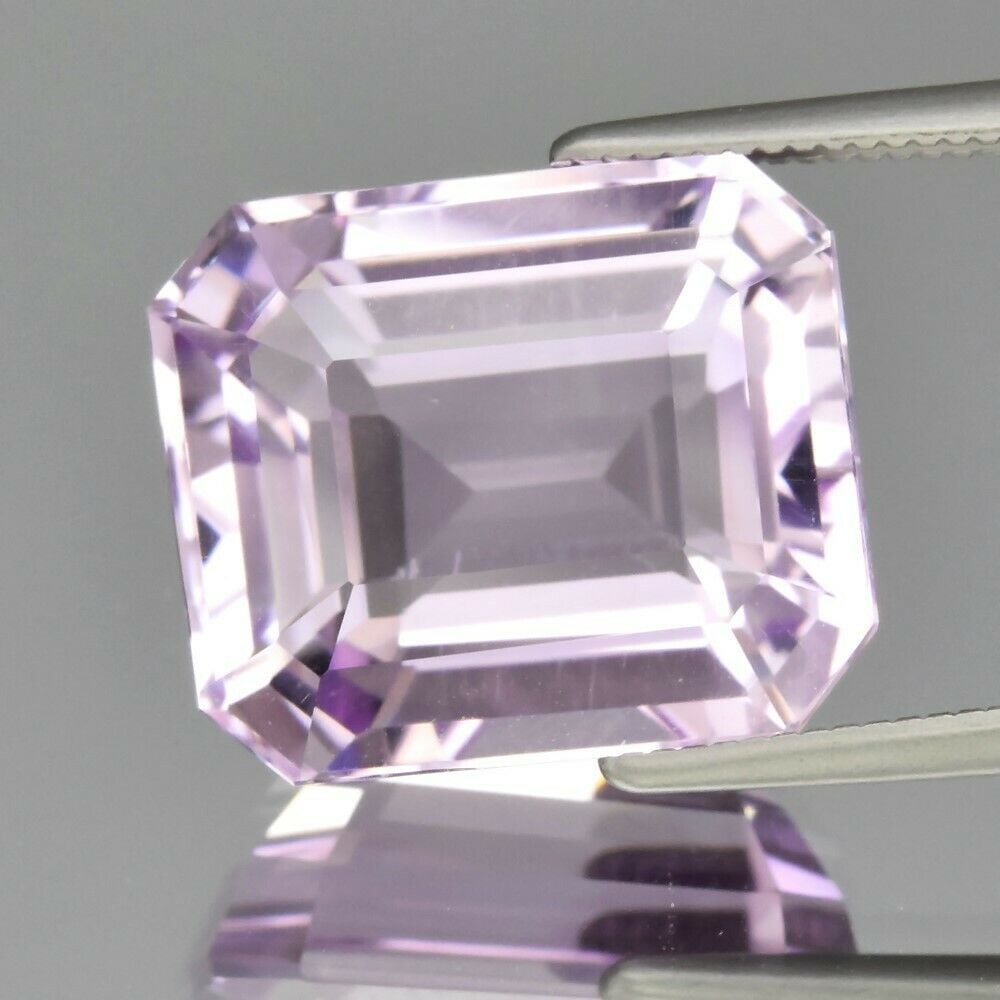 9.86 ct. Natural Unheated Purple Amethyst - BRAZIL: 9.86 ct. Natural Unheated Light Purple Amethyst - BRAZIL Shape - Octagon Color - Light Purple Clarity - IF Ct. Weight - 9.86 ct. Dimensions - 13.70 x 11.70 x 8.40 mm Origin -