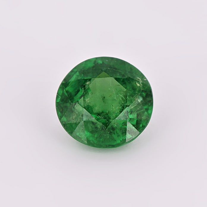 0.72 ct. Tsavorite Garnet - KENYA, EAST-AFRICA: 0.72 ct. Tsavorite Garnet - KENYA, EAST-AFRICA Color - Vivid Green Cut - Round Ct. Weight - 0.72 ct. Clarity - VS Origin - KENYA, EAST-AFRICA Treatment -