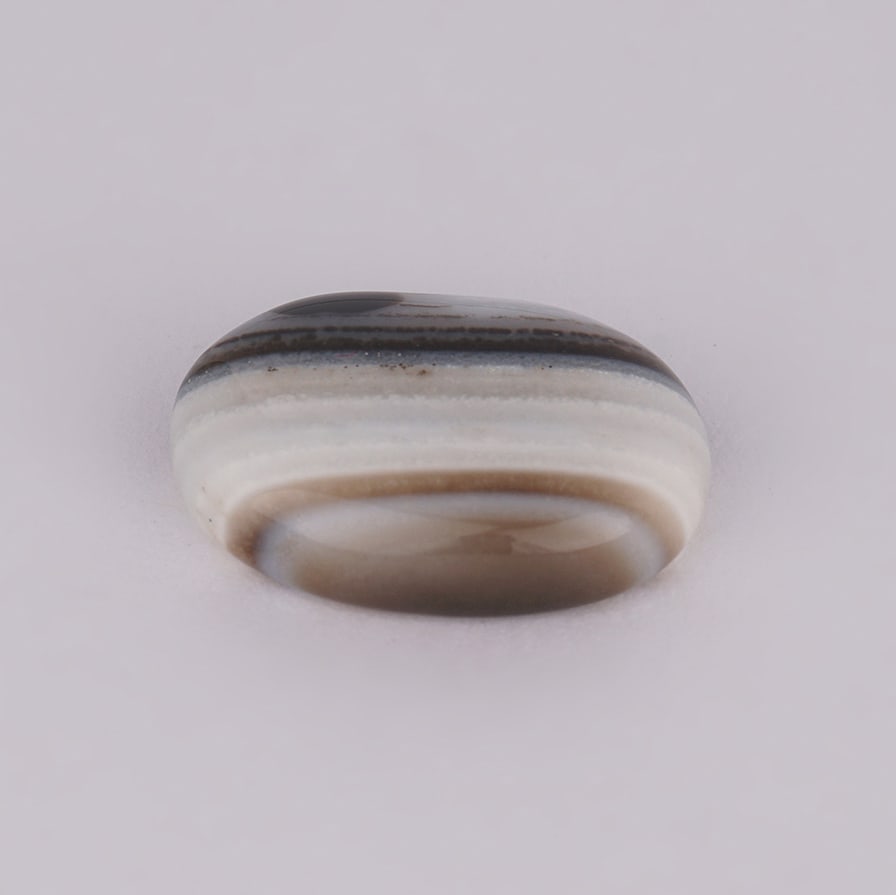 9.14 ct. Onyx - MADAGASCAR: 9.14 ct. Onyx - MADAGASCAR Color - White Clarity - Opaque Cut - Cabochon Ct. Weight - 9.14 ct. Origin - MADAGASCAR Treatment - None