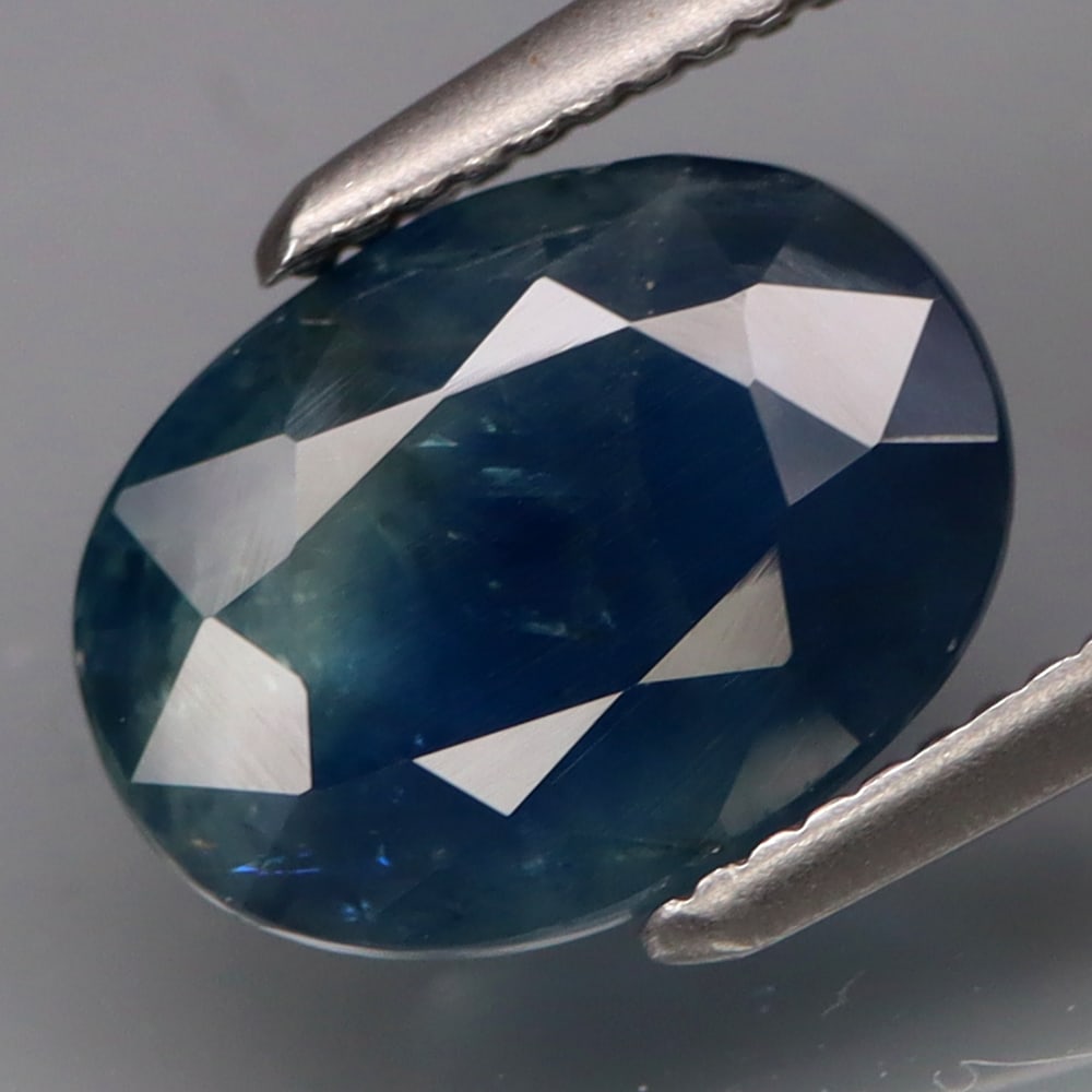 HGL Certified 2.31 ct. Sapphire - AFRICA: HGL Certified 2.31 ct. Sapphire - AFRICA Color - Blue Cut - Oval Ct. Weight - 2.31 ct. Size - 9.2 X 6.8 X 3.9mm Treatment - Heated Only Clarity - I1 - I2 ORIGIN - A