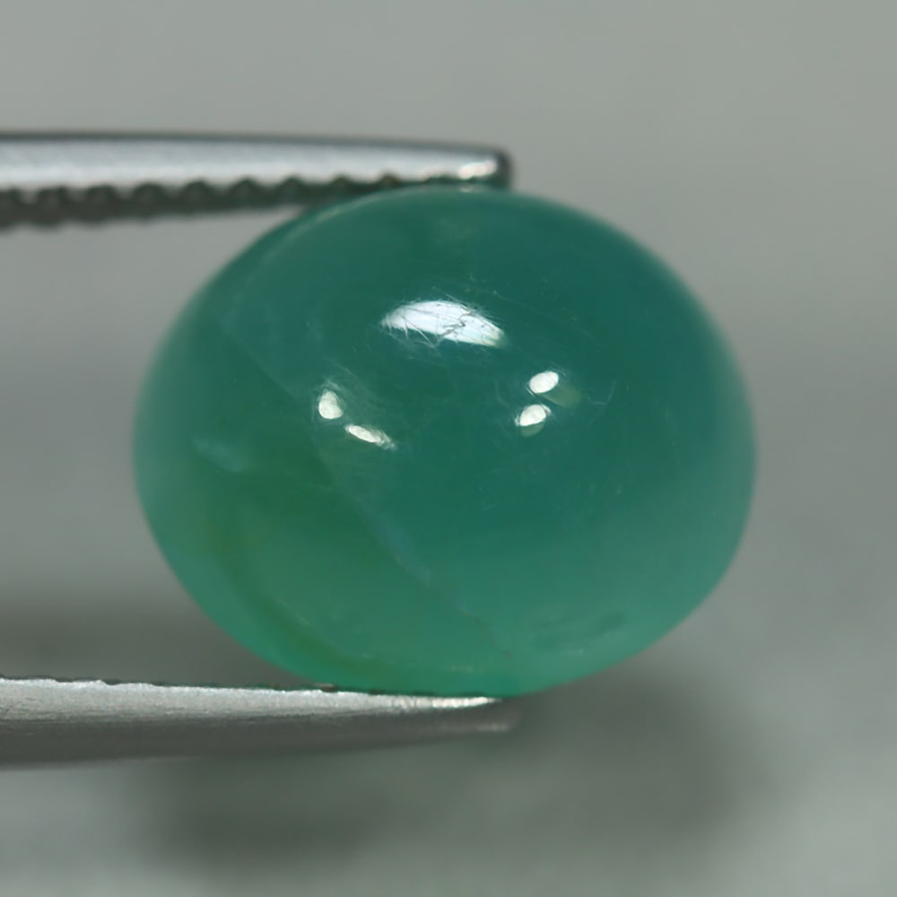 HGL Certified 4.92 ct. Grandiderite - MADAGASCAR: HGL Certified 4.92 ct. Grandiderite - MADAGASCAR Ct. Weight - 4.92 ct. Shape - Oval Cabochon Color - Blue Dimensions - 11.10 x 9.40 x 6.20 mm Clarity - VS Treatment - Unheated