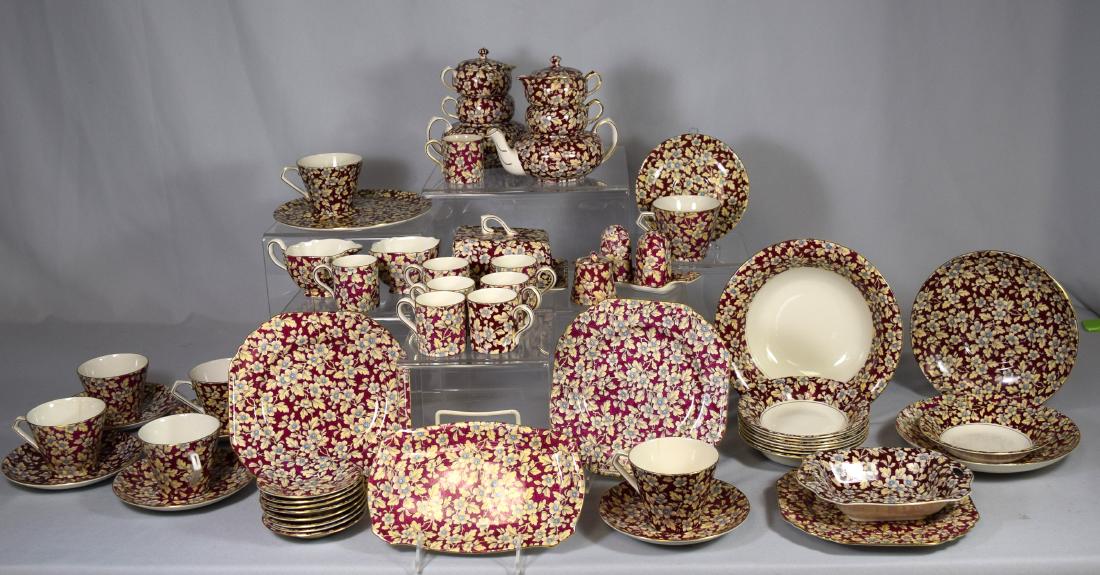 LORD NELSON WARE ENGLISH ROYAL BROCADE PATTERN CHINTZ: English Chintz porcelain dinnerware. Approximately 57 pieces in Royal Brocade pattern. chintz porcelain dinnerware includes: one cheese keeper, Two teapots, 8 demitasse cups and saucers, 6 teacups and