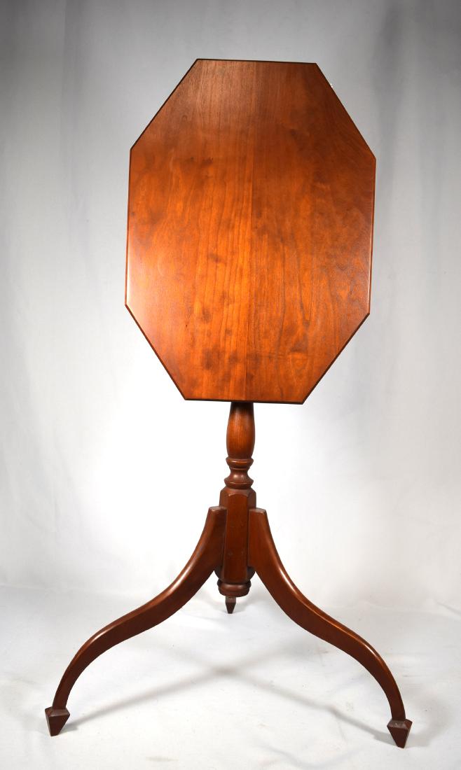ELDRED WHEELER TILT-TOP STAND:: Elongated octagon top. Labeled under top. Spray legged with spade top.