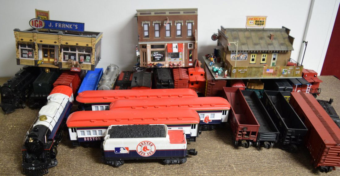 TRAINS & RAILROAD BUILDINGS:: Consisting of three detailed buildings with interior accessories, Lionel 2055 engine and tender with cars, Lionel Northern Pacific switcher and cars, William switcher and cars and Red Sox baseball tra