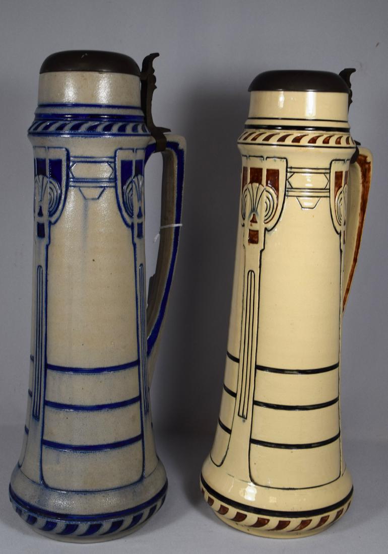 TWO GERZ STONEWARE SECESSIONIST DESIGN COVERED STEINS: (1 of 4)