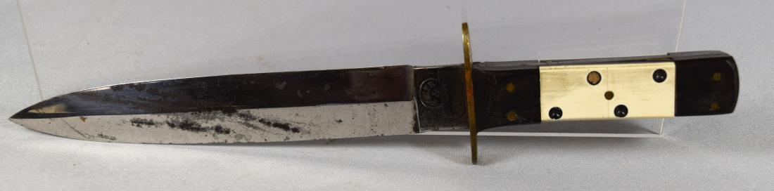 GAMBLER’S COMPANION KNIFE: Possibly Civil War era. Bone and ebony handle decorated as gambling dice. Blade marked Gambler’s Companion on one side and maker’s mark Poker & Live Sheffield on reverse. Blade measures 7 ½ inche