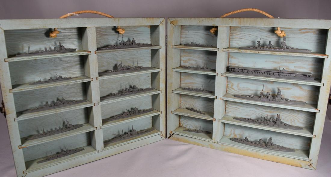WORLD WAR II USN NAVY RECOGNITION TRAINING: 1:1200 scale die cast models. US Navy and Japanese Navy. Wooden box opens with shelves holding 20 die-cast ships. Box measures 32 inches x 14 inches. Original stenciling, U.S.N. Special Devices Divisi