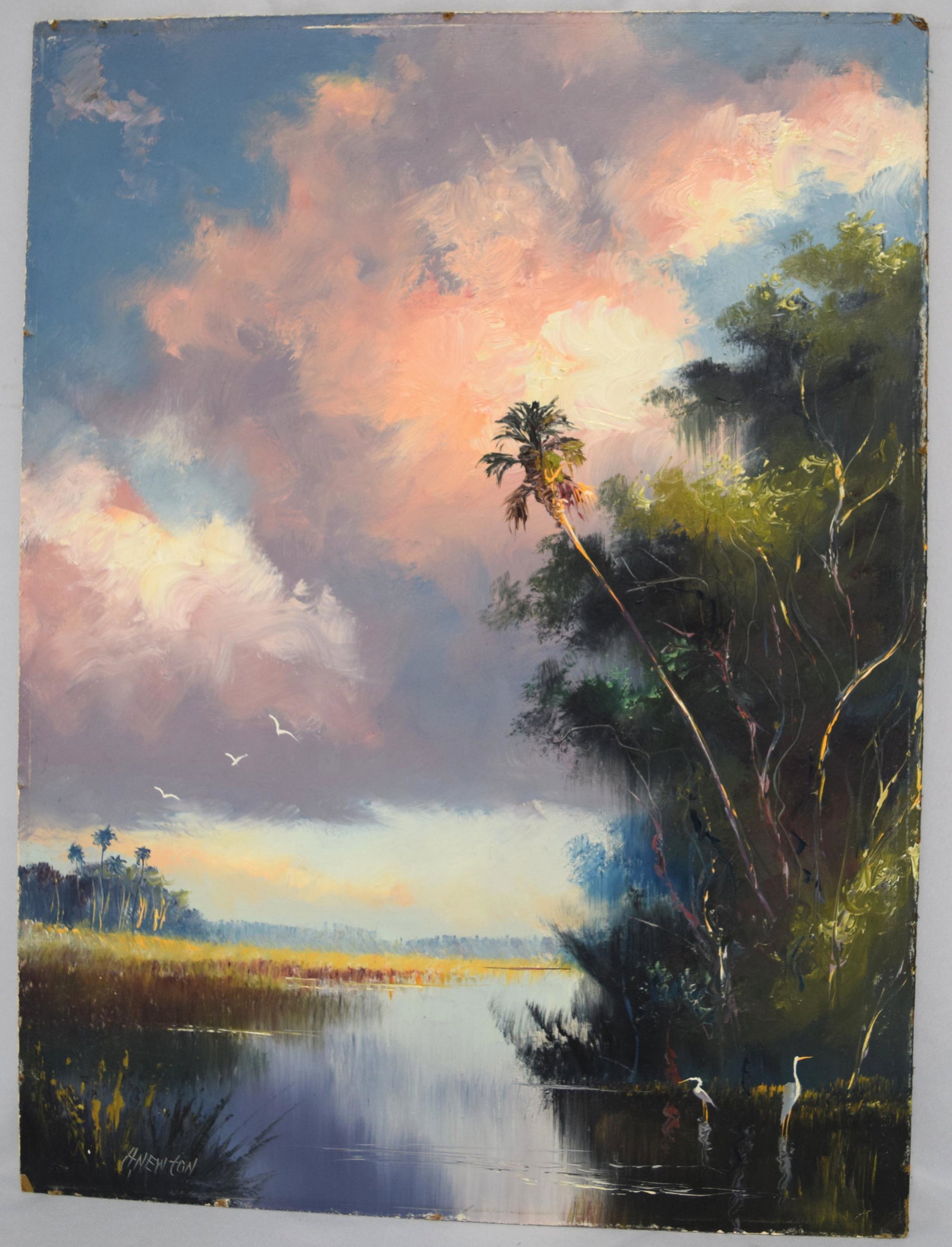 FLORIDA “HIGHWAYMEN” HAROLD NEWTON OIL ON BOARD:: (Florida 1934-1994). Florida river landscape with palm trees, egrets and pink sun-setting sky. Signed lower left H. Newton. Newton was one of the Florida African-American painters known as the Highway