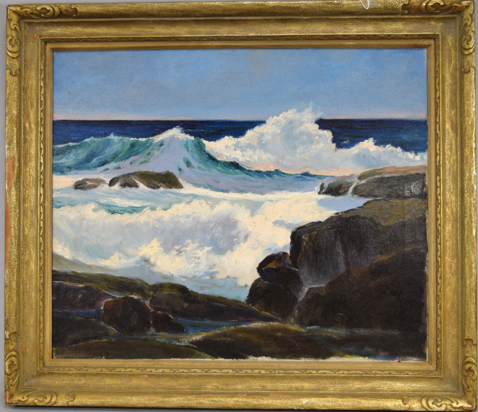 ANTHONY THIEME SEASCAPE OIL ON CANVAS:: (Massachusetts/California 1888-1954). Seascape. Surf crashing against the rocks. Image 20 inches x 24 inches. Artist stamp ono back of canvas and on stretcher. Gilt frame.