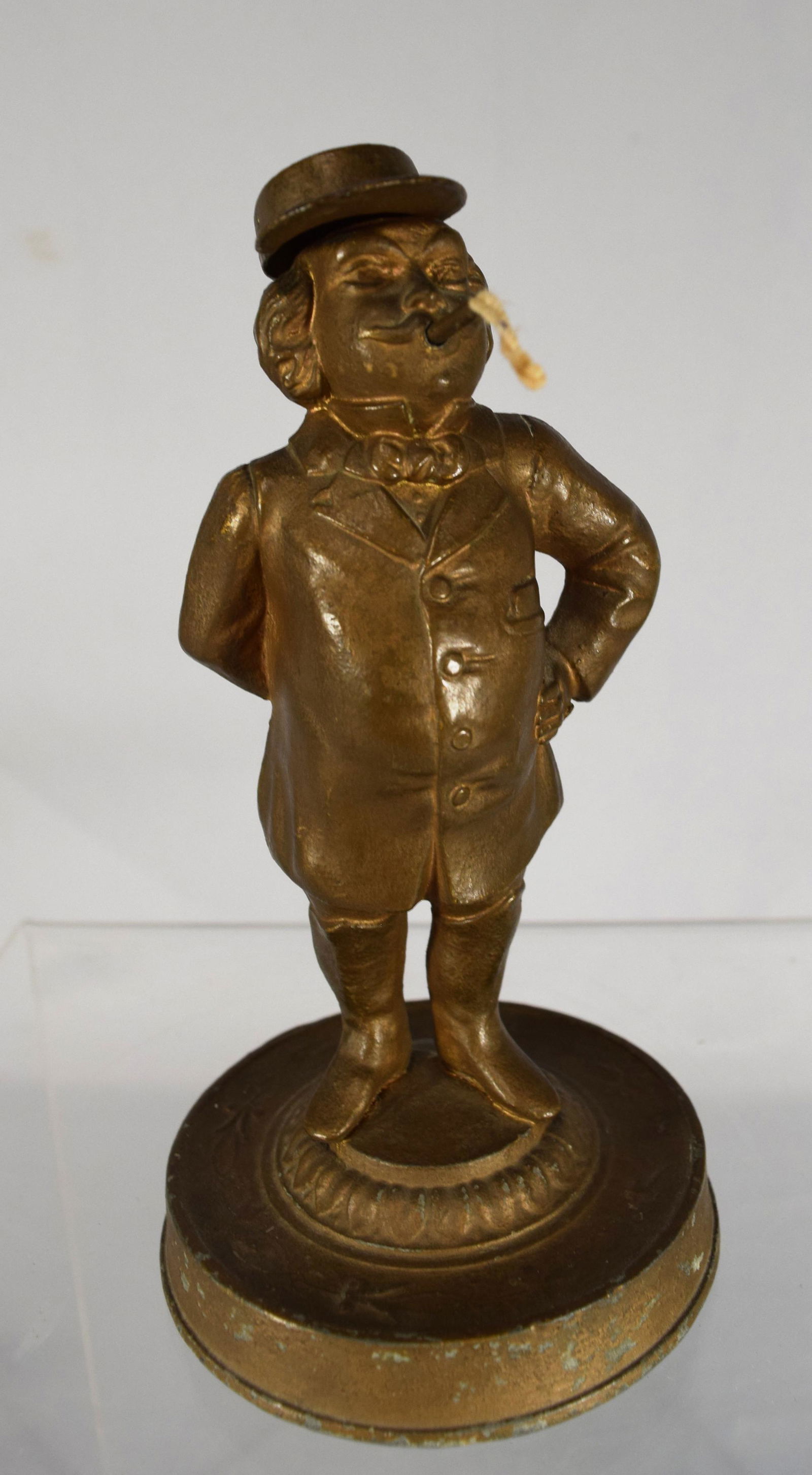 19TH C FIGURAL CIVIL WAR PERIOD CIGAR LIGHTER:: Spelter figure of a man Cigar Lighter. Hat lifts for refill. Original finish. Measures 6.75 inches tall