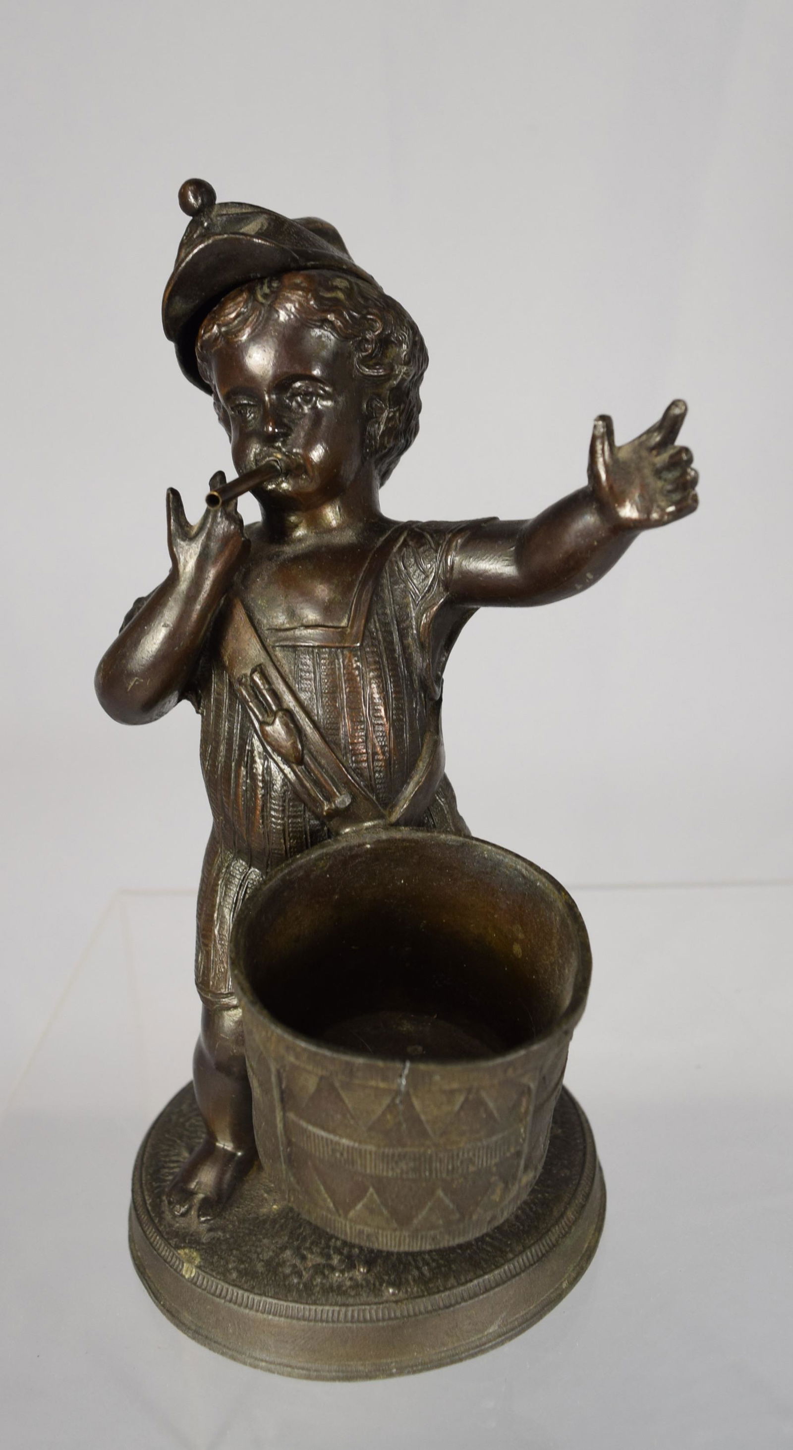 19TH C FIGURAL CIVIL WAR PERIOD CIGAR LIGHTER:: Spelter drummer boy figural Cigar Lighter. Hat lifts for refill. Original Finish. Measures 7 inches tall.