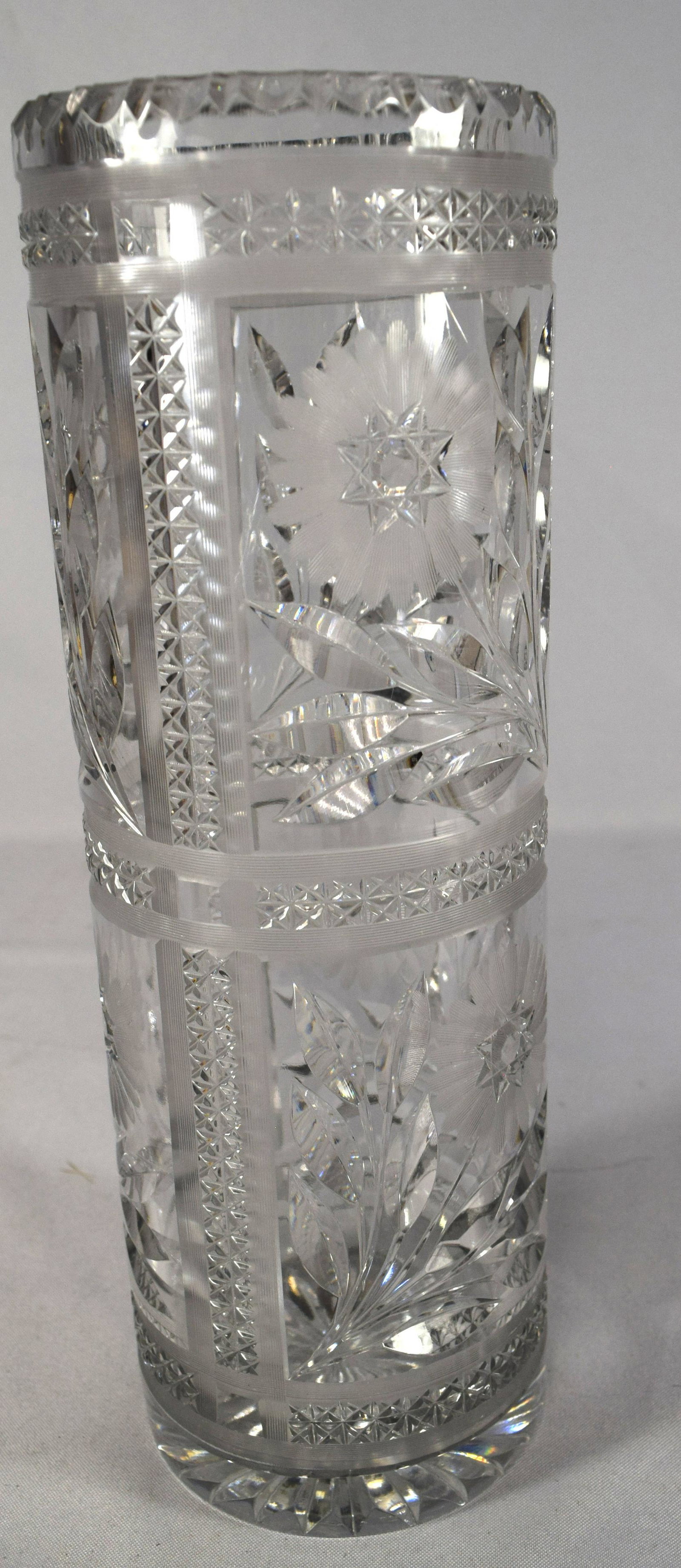 PAIRPOINT CUT GLASS VASE:: Ca. 1910 or 1920s. American brilliant period. Cut panels with center flower. 12 inches tall.