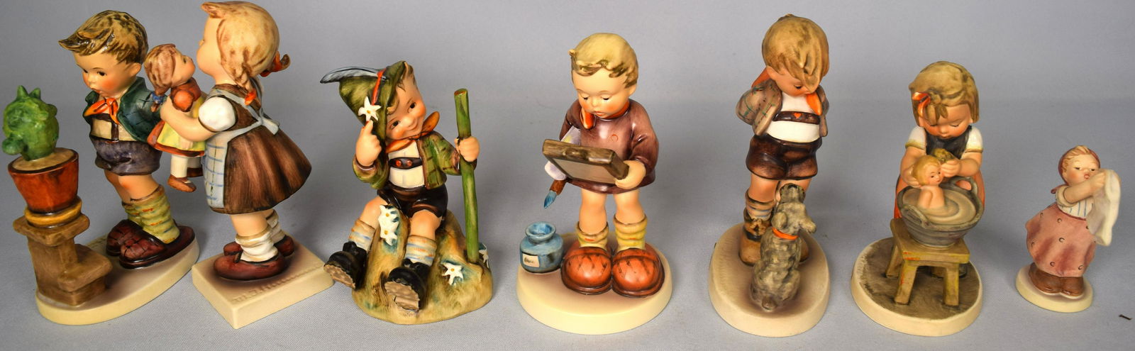 311, 314, 315, 317, 318, 319, 321 4/0 HUMMEL FIGURINES: (1 of 2)