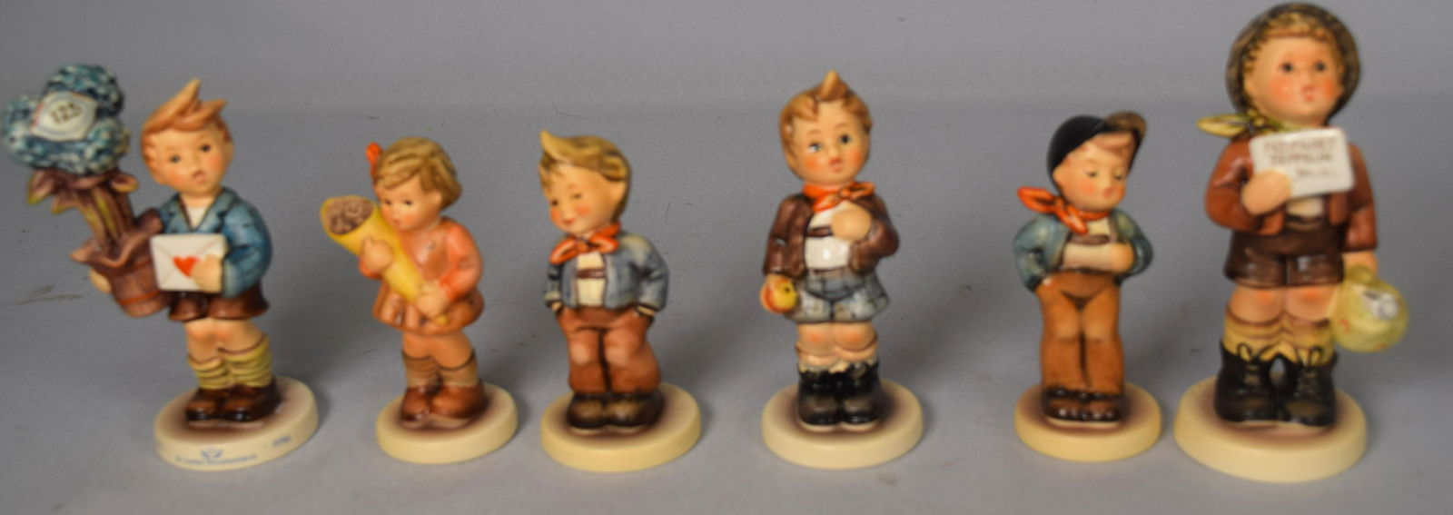539, 549, 553, 554, 560, 569 HUMMEL FIGURINES: (1 of 2)