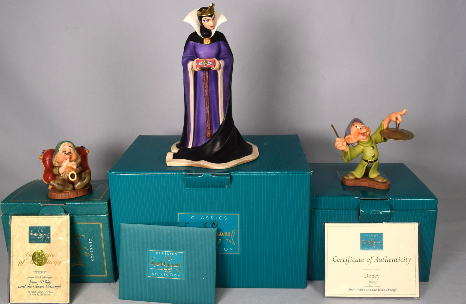 THREE WALT DISNEY BOXED PORCELAIN FIGURINES: (1 of 4)