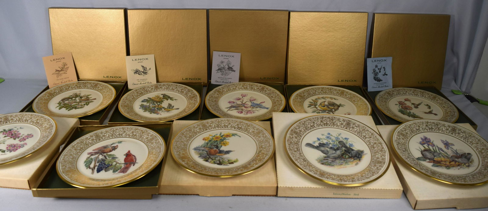 1970-1979 TEN YEAR COLLECTION OF LENOX LIMITED EDITION: Consisting of ten plates hand painted birds and borders in original boxes. Adapted from original works of art by Edward Marshall Boehm. Excellent condition, one with original price tag of $50 dollars.