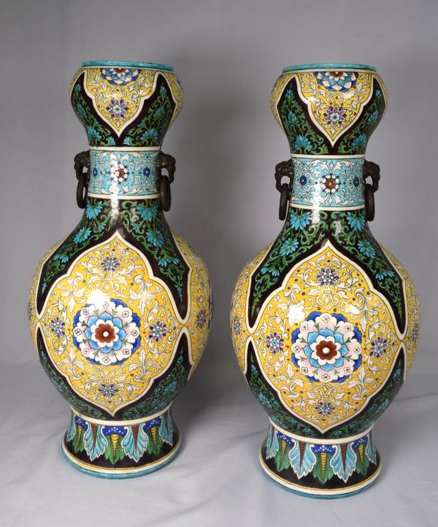 PAIR THEODORE DECK VASES: Double lion head ring handle vases. Islamic style. Theodore Deck French 1823-1891. Theodore Deck prominent French ceramacist, renowned for his ceramic vessel created using traditional Islamic processe