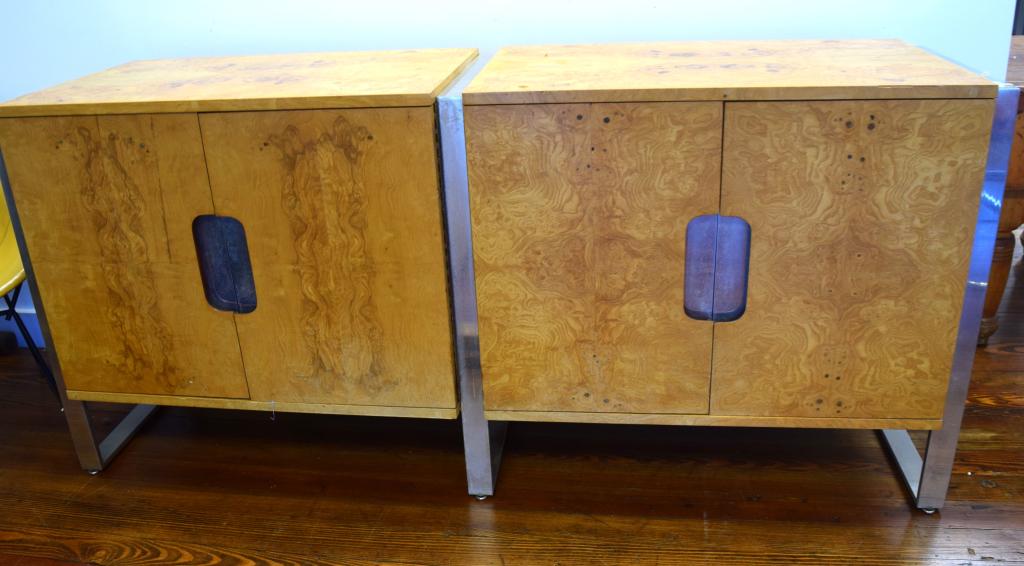 MID CENTURY MILO BAUGHMAN STYLE CREDENZA:: Mid Century. Ca 1950's/70's. Double sideboard/buffet. Beautiful grained burled olive wood. Two cabinets divided by chrome banding and recessed chrome pulls. Supportedby sleek polished chrome legs. Mea