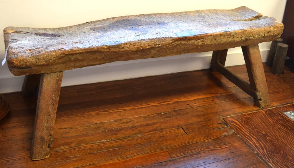 PRIMITIVE 19TH C HOG BUTCHER: Ca 1850's/70's. Antique primitive hog bench. The hog bench traditionally was used to pig slaughter and preparation. Measures approximately 18-20 inches wide x 67 incheslong x 22 inches tall. Wide angl