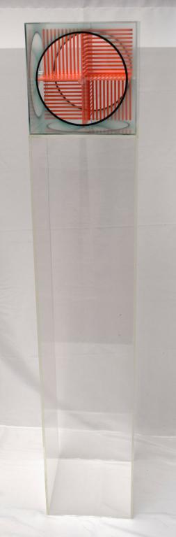 MID CENTURY MODERN LUCITE FLOOR SCULPTURE:: In the style of Jesus Soto (Venezulan 1923-2005) Kinetic artist. Optical illusion design. Top with 10 inch clear cube with black circles and center with crossed grid in red. Sits on clear square side 