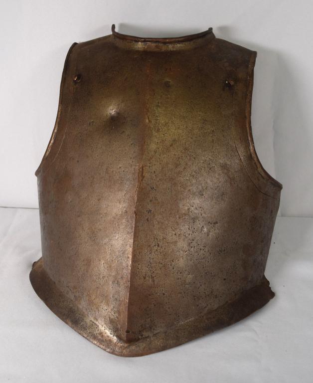 EARLY EUROPEAN IRON ARMOR BREAST PLATE: Iron breast plate with stamped hallmarks. 18 inches tall x 18 inches wide. Rolled edges, spade bottom. (Added eye hook inside for mounting). Surface minor rust.