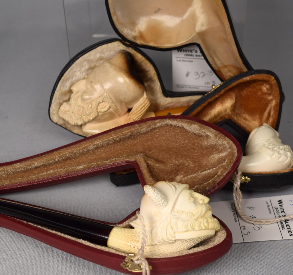 3 SMOKE BLOCK MEERSCHAUM FIGURAL PIPES: 1) Signed SCOSGUI Viking with long amber mouth piece. 9 1/2 inches. 2) Ottoman man with butterscotch mouth piece. 6 inches. 3) Ottoman man with marbleized mouth piece. 5 inches long. All with Original