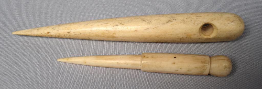TWO WHALE BONE SAILORS FIDS: Two pieces. Carved whale bone sailors fids. Measure 7 inches and 5 inches. Good condition.