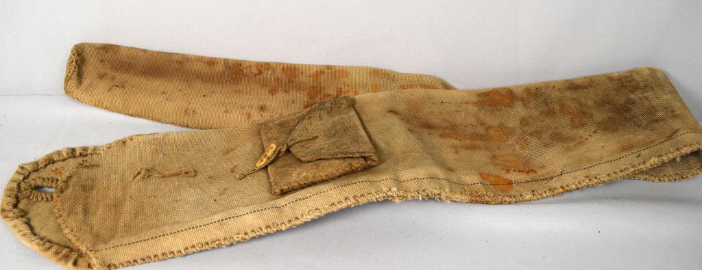 EARLY SAILOR MADE GUN CASE: 19th century, 47 inches long x 6 inches wide. Whale bone button. Hand sawn canvas. Normal wear. Good condition.