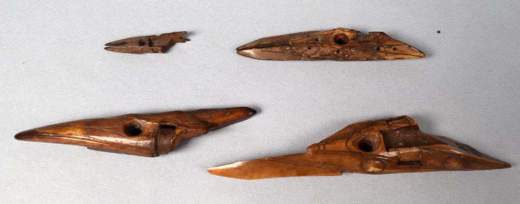 OLD BEHRING SEA PUNUK STYLE HARPOON POINTS: 4 pieces. Sealing harpoon points and small point. consisting of 10 5 1/2 inches long with engravings. 2) 4 1/2 inches long with engraving Punuk style. 3) 3 1/2 inches with engraving punuk style. 4) 1