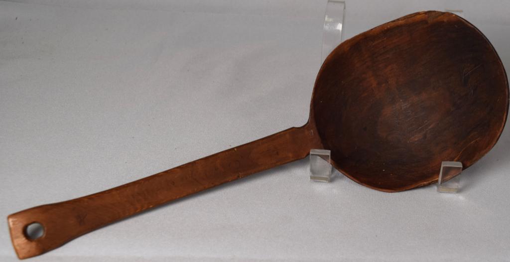 ESKIMO WOODEN LADLE: Cape Prince of wales. Carved softwood. 12 1/2 inches long. Good condition.