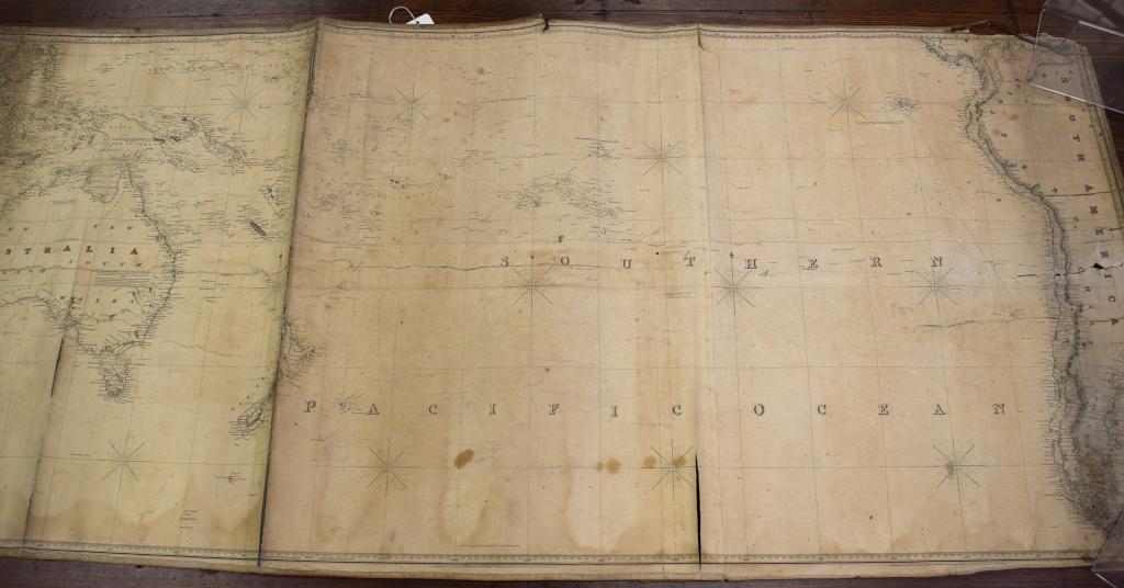 1825 J. W. NORIE SOUTH PACIFIC CHART OR MAP: 32 inches x 73 inches. Canvas backed and blue backing. Upper corner and splits. John William Norie (1772 in London – 1843), was a mathematician, hydrographer, chart maker andpublisher of nautical bo