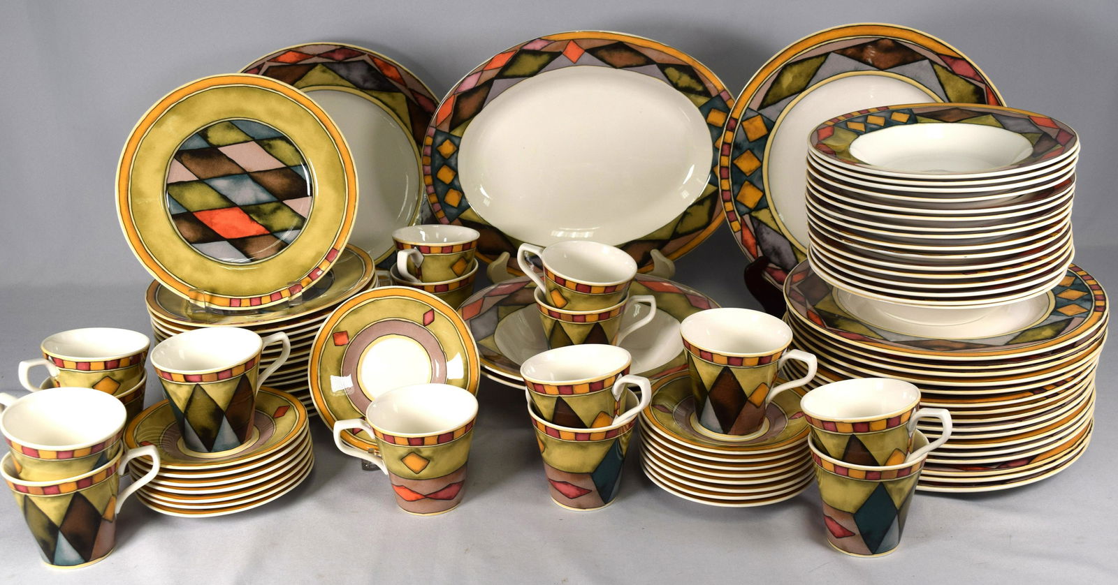 BONE CHINA DINNERWARE SET PALAZZO: 84pcs. BONE CHINA DINNERWARE SET PALAZZO BY SASAKI DESIGNER PAULA ZANGER: 84 pieces. Consisting of 16 bowls 8 ½ inches. 2) 15 cups. 3) 16 desert plates. 4) 16 Salad plates 8 ½ inches. 5) 16dinner pl