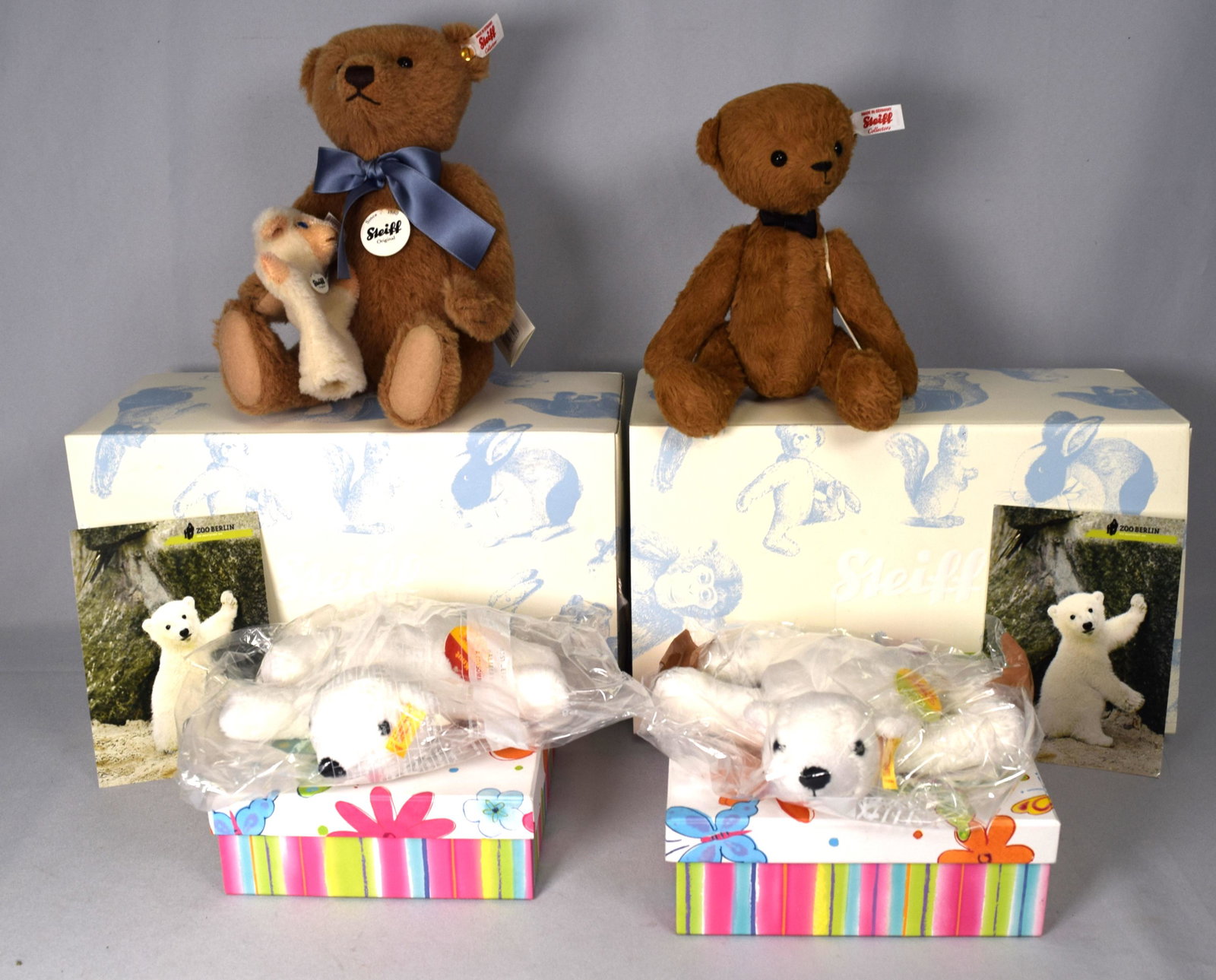 2 BOXED STEIFF ANIMALS & TWO BOXED BEARS: Consisting of 1) Big Timmy with paper work and box. 2) Little boy blue paperwork and box. 3) Two boxed Knut bears. Good condition.