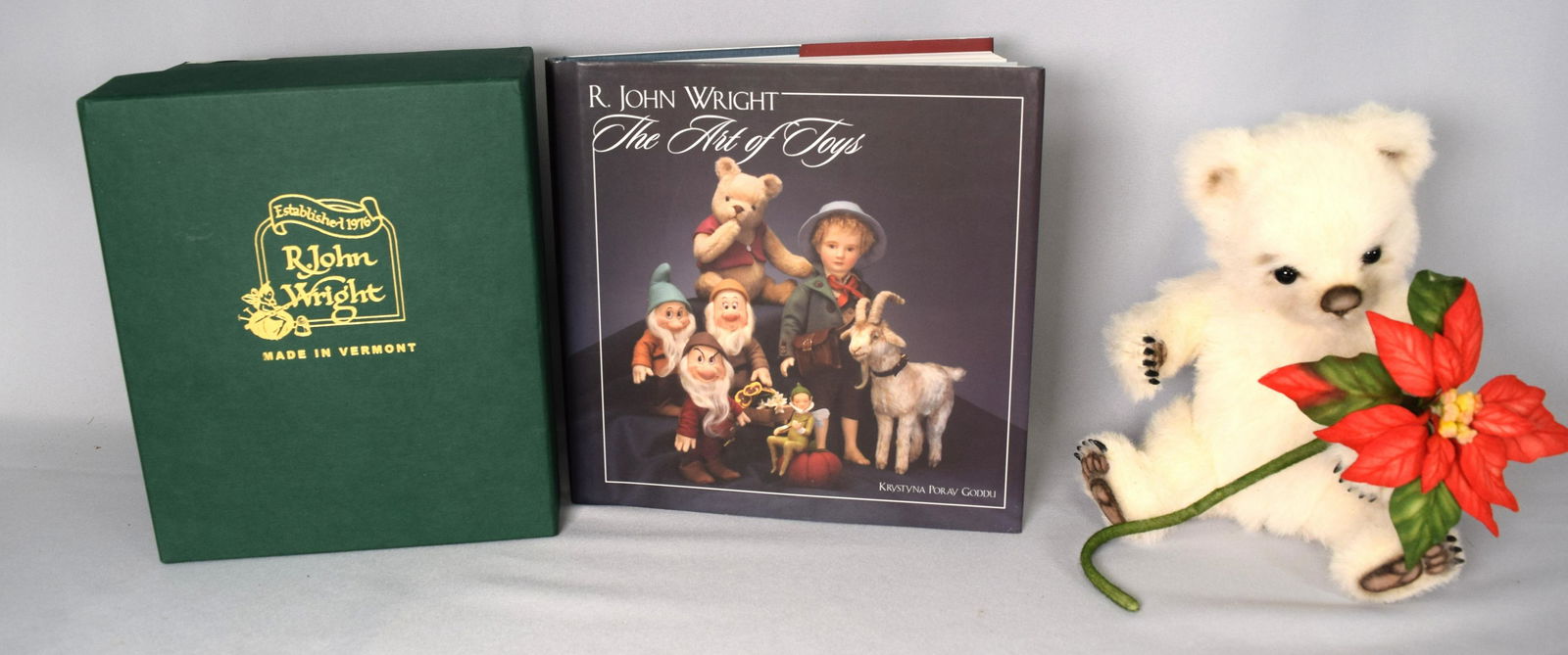 R. JOHN WRIGHT BOXED BEAR & BOOK: Lot consisting of 1) The Art Of Toys 2004 book. 2) Digby #103 Kola bear in original box. This delightful little fellow named "Digby" is the third issue in the RJW "Classic Teddy's" series of bears bas