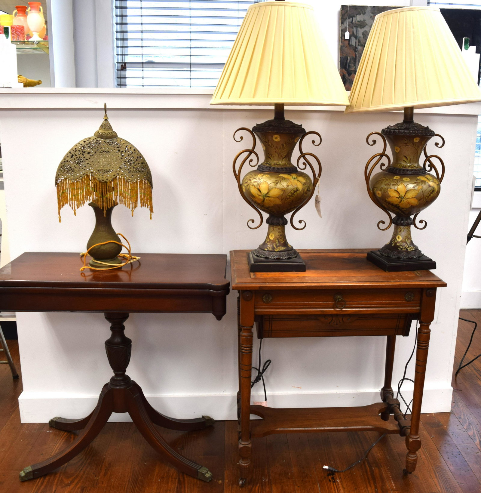 ASSEMBLED FURNITURE AND LAMP GROUPING: Consisting of 1) Dome top refinished trunk. 40 inches wide. No interior tray. No handles and one lock hook broken. 2) Victorian sewing table. ca 1870. Walnut and 27 inches wide. No felt orleather top.