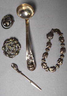 COLLECTION GEORG JENSEN STERLING JEWELRY & ETC.: Group consists of 1) ladle #107 with acorn top. 2) Bracelet #96. 3) Pin #122. 4) Brooch #159. 5) Olive fork or pick . Approximately 3.6 troy ounces. Georg Arthur Jensen (1866-1935) Copenhagen was