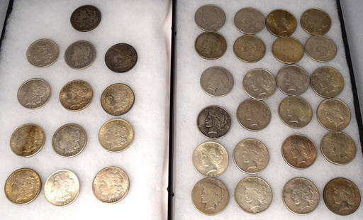 US MORGAN & PEACE SILVER DOLLARS: Consists of 37 silver dollars. Morgan 1884, 1886, 1886, 1886, 1896, 1896, 1898, 6 1921. Peace dollars 24 all are dated 1922 . Circulated condition.