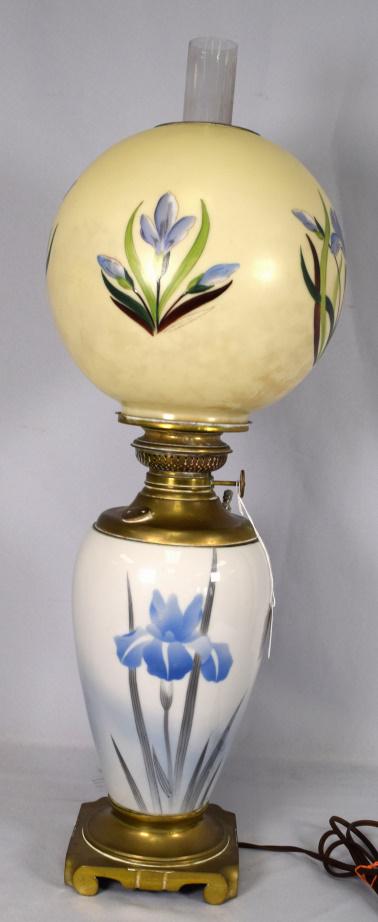 PORCELAIN GONE WITH THE WIND TYPE LAMP: Porcelain base with high gloss similar to Royal Copenhagen. Converted to electricity. Replace hand painted ball shade. 26 inches tall. Brass mounted.