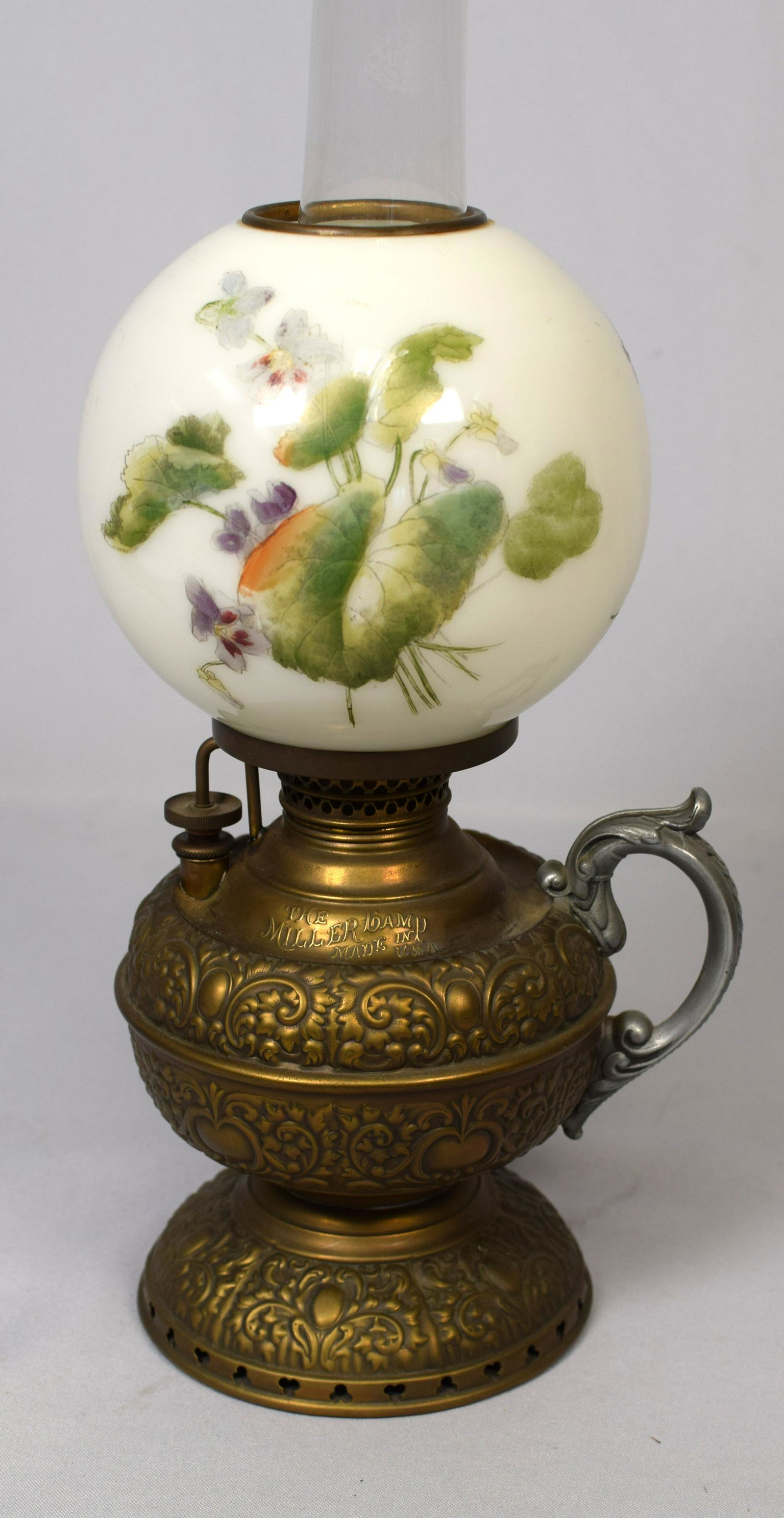 19TH C ANTIQUE KEROSENE MILLER OIL FINGER LAMP: Fancy repousse brass footed base with silverd handle. Original hand painted ball shade and original signed Miller chimmey. 13 1/2 inches tall. Excellent condition.