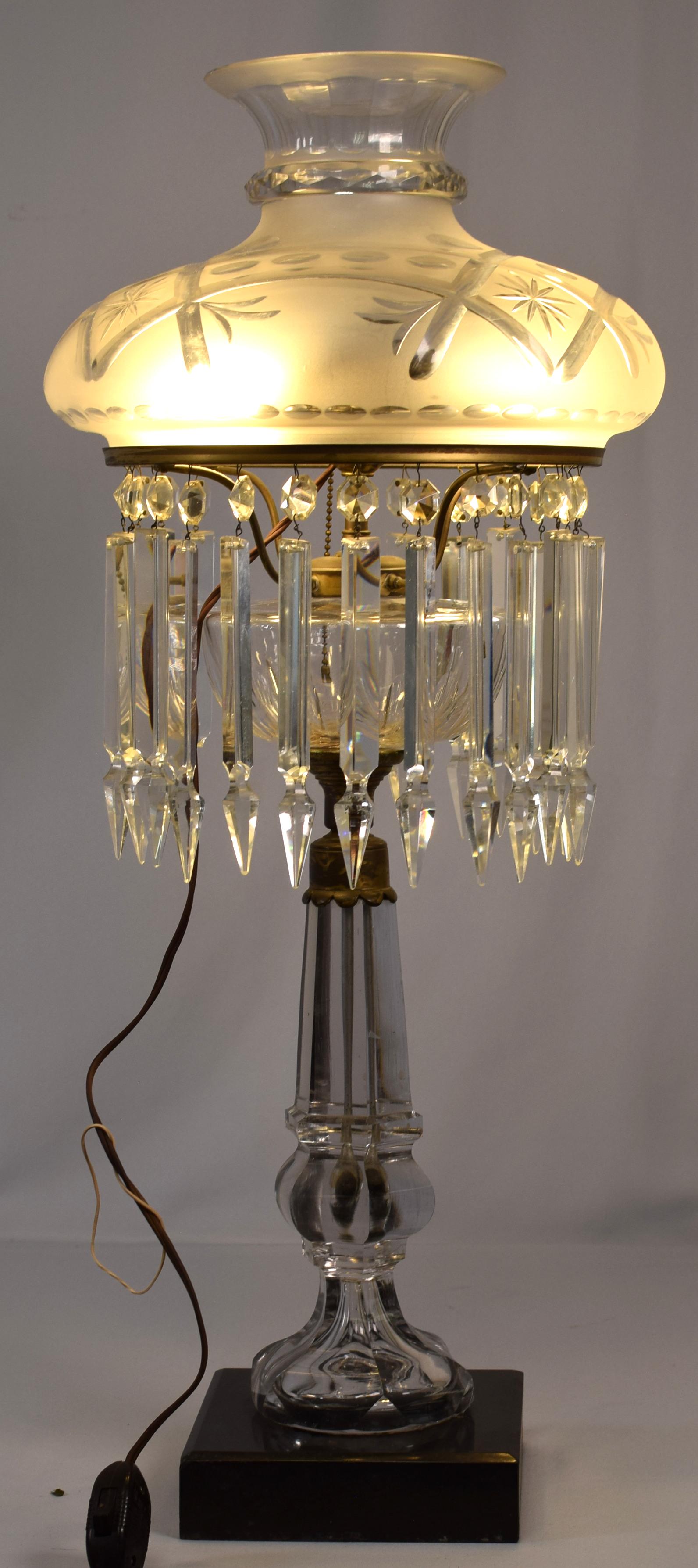 BANQUET SIZE CUT GLASS ASTRAL LAMP ELECTRIC: This is a large (29 1/2 inches tall, with 13 inch shade at widest) electric cut glass astral lamp. Early 20th century. Overall Excellent condition, a couple small checks to the glass stem andmissing s