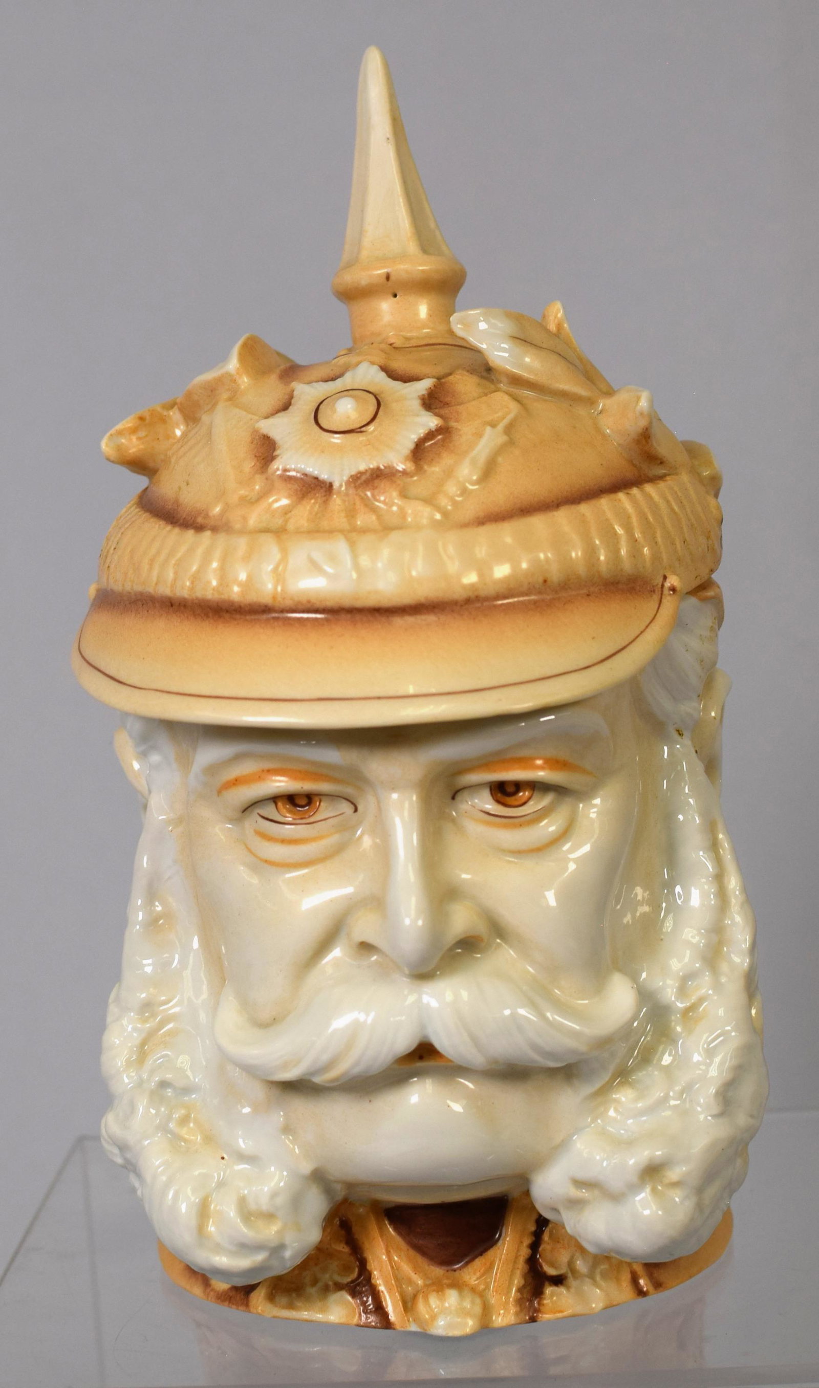 GERMAN KAISER WILHELM TOBACCO HUMIDOR JAR: Figural porcelain jar. Signed Musterschutz.. 8 inches tall. Good condition.