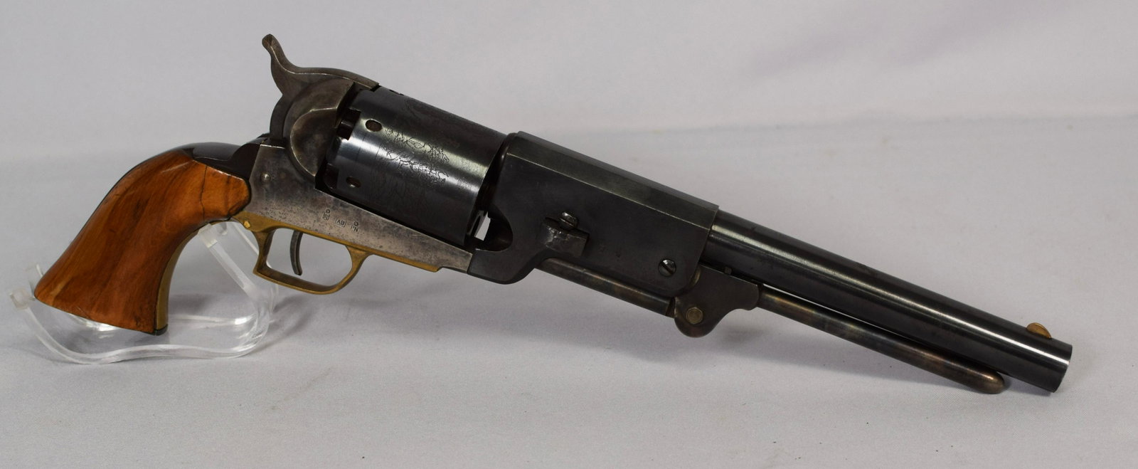COLT WALKER 44 BLACK POWDER REPRODUCTION REVOLVER: Ca. 20th century. Marked Whineyville Walker 1847 Cal. 44 black powder only made in Italy S Marco Gardone Brescia. Matching serial numbers 14591. Original blue. Scratch or repair on side. Springand see