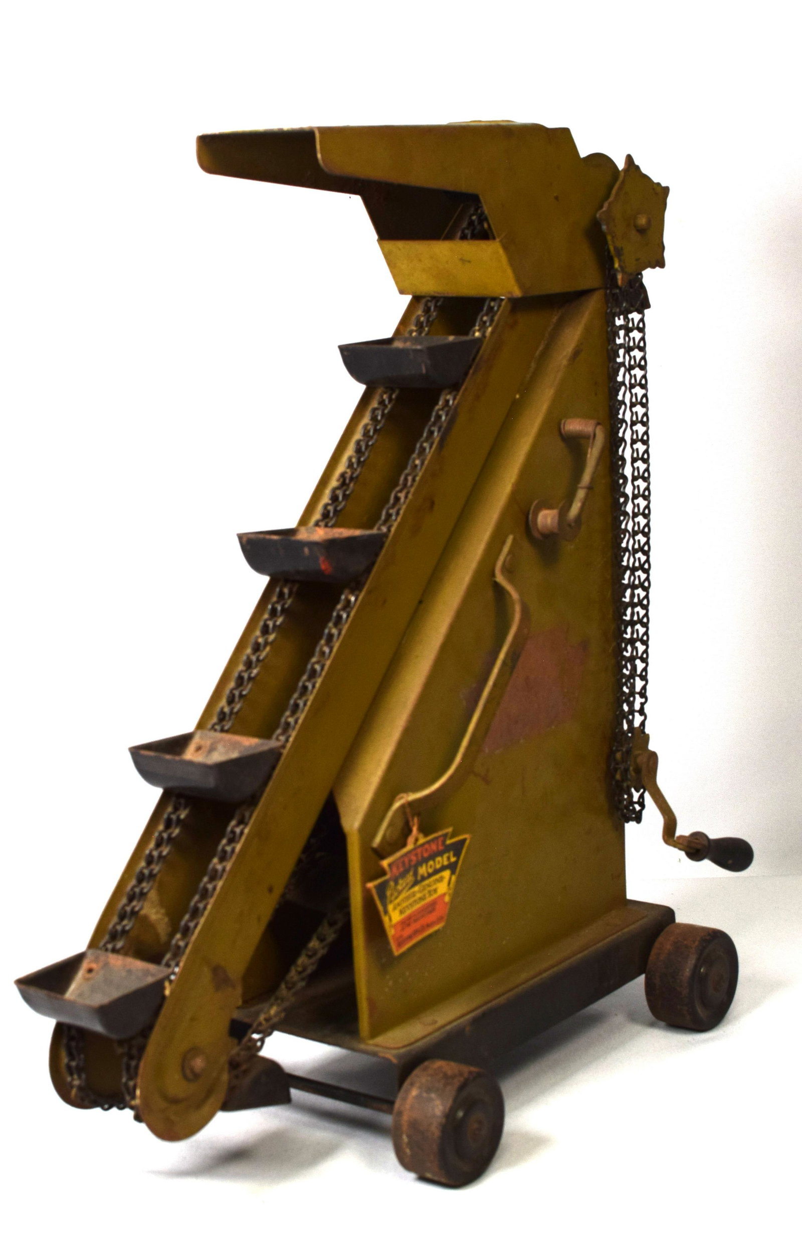 1930'S KEYSTONE TOY SAND AND GRAVEL LOADER: 1930's Keystone toy sand and gravel loader in steel with wheels,packard model. Measures 18 inches tall. Good condition,some rust and scratches,one chain loose.