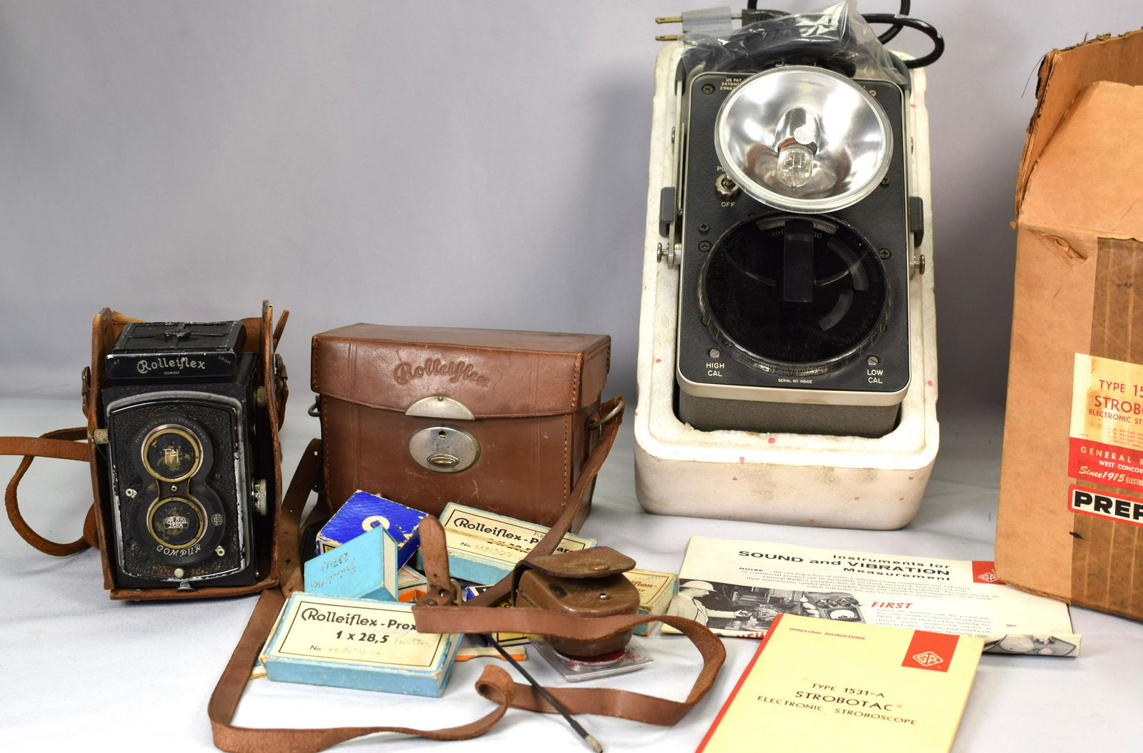 FRANK & HEIDECKE ROLLEIFLEX CAMERA & STROBOSCOPE: Frank & Heidecke-Braunschweig Rolleiflex DRP DRGM Synchro-Compur Camera having a serial #240568 and a Zeiss Jena nr 1390585 Tessar 1;3, 8 f= 7.5 cm lens together with a Rolleiflex leather case andacce