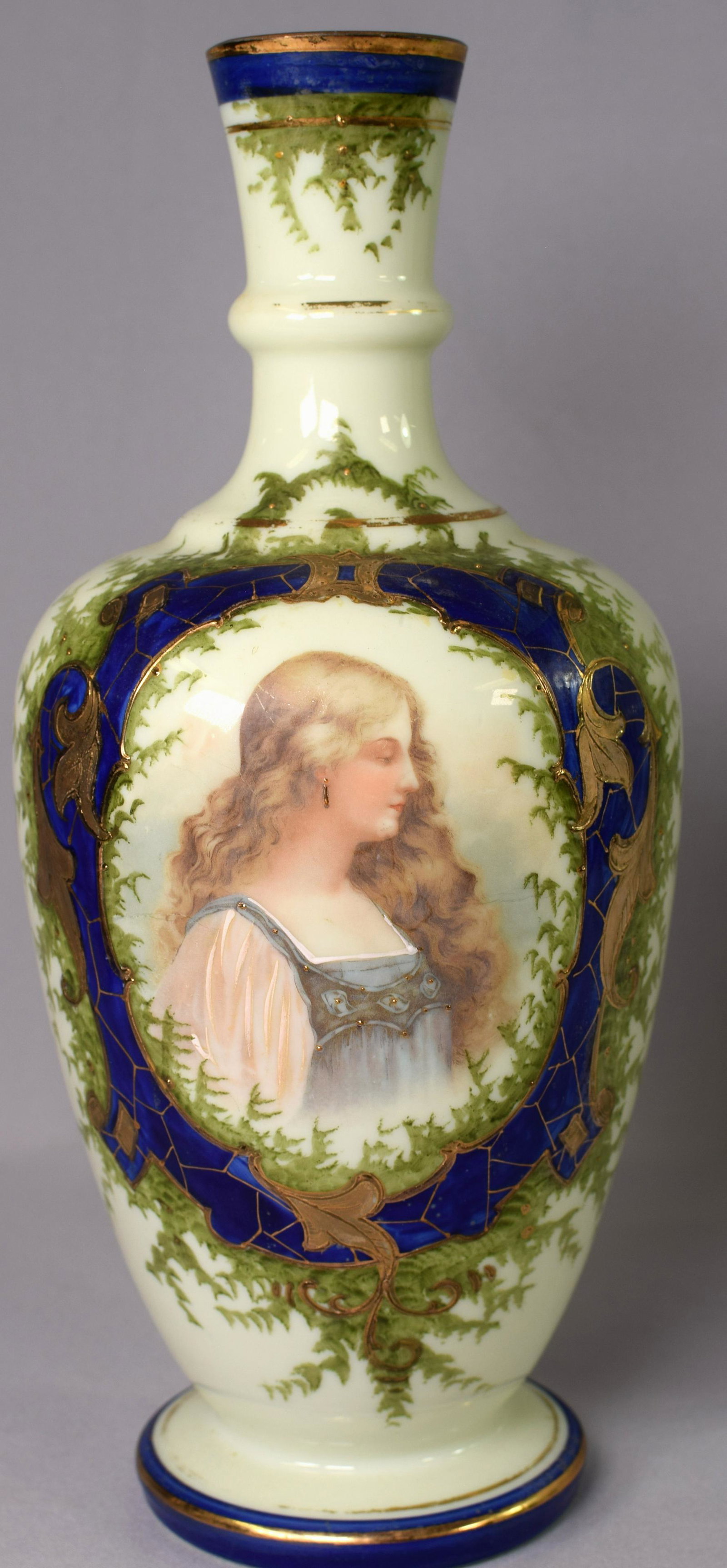 19TH OPALINE HAND PAINTED GLASS PORTRAIT VASE: Hand painted vase with portrait of a woman on it. Has a blue and gold framed border around the portrait and the rim painted highlight of the vase. 14 inches tall, good condition.