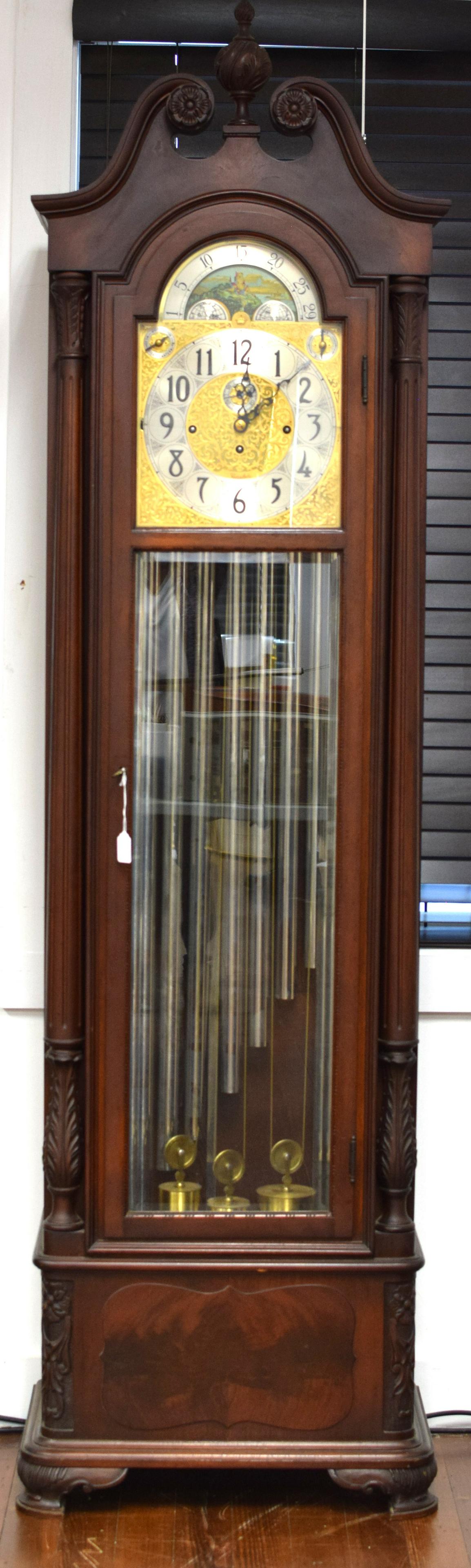 EARLY HERSCHEDE 9 TUBE TALL CASE CLOCK: Ca 1950. Serial #57111. Purchased in 1951.Herschede Clock Company (1911-1968) tall case clock. Honduras mahogany case with carved columns, feet and rosette open pediment crest, beveled glass. Nine tub