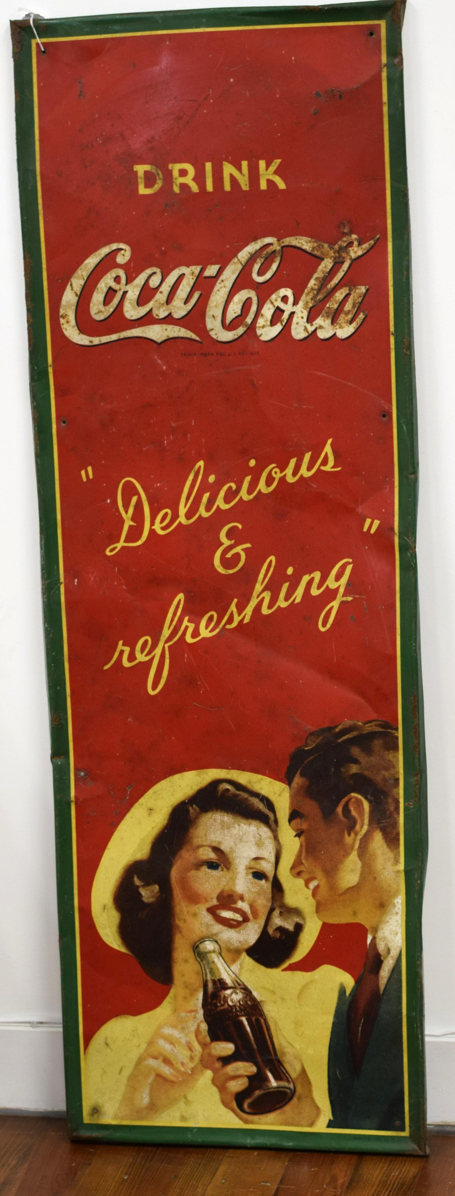 RARE EMBOSSED VERTICAL TIN COCA COLA SIGN: Rare Coca-Cola sign. This large, vertical sign 54 x 18 in., is a beauty. Despite some condition issues, its rarity and bold colors still make it quite desirable. Much of the dirt may be easilywiped aw