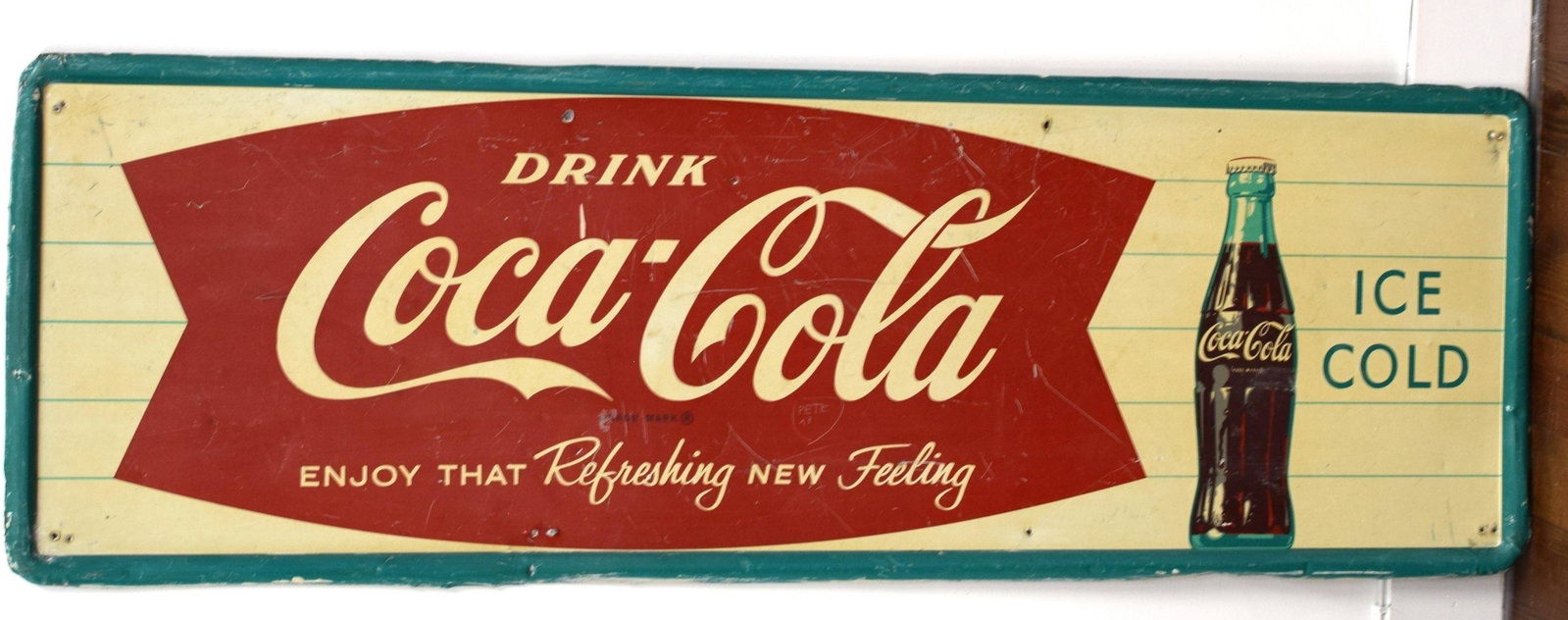 LARGE EARLY TIN COCA COLA SIGN, 54 X 18 IN: Beautiful, large vibrant Coca-Cola tin sign. Has condition issues as far as mounting holes around border, scratches, fading paint. Despite that, the colors really pop and from a few feet, it looksamaz
