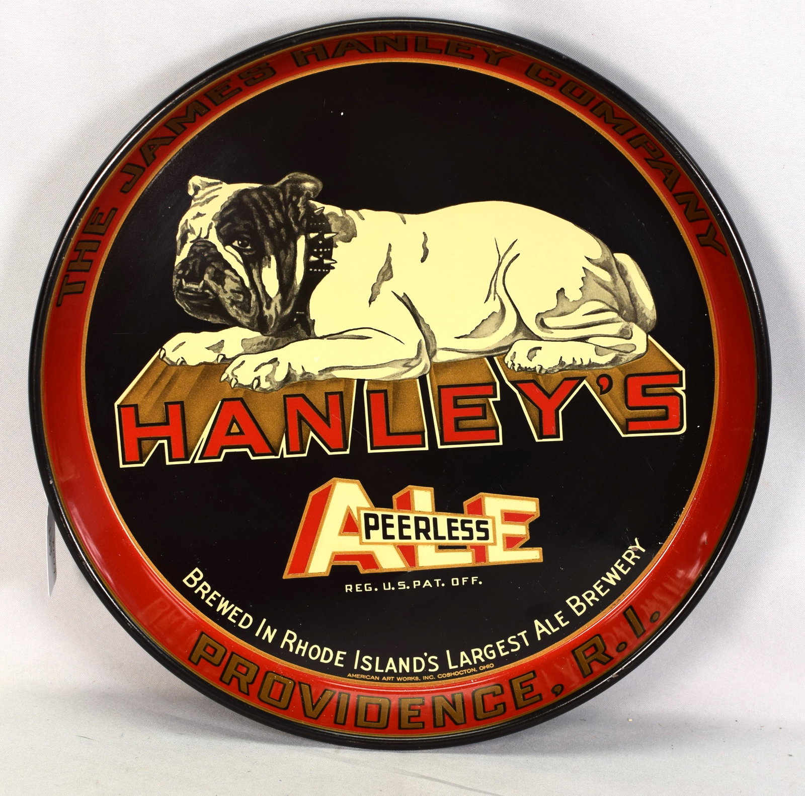 HANLEY'S PEERLESS ALE BEER TRAY, PROVIDENCE: Excellent and extremely clean tin beer tray with large English Bulldog from Hanley's Peerless Ale, Providence, R.I. In near mint condition. Measures 12 in. diam.