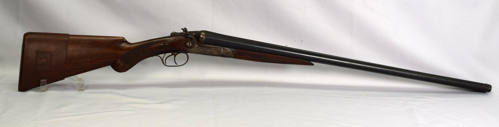 ITHACA 12 GAUGE (NEW ITHACA MODEL) DOUBLE SHOTGUN: Damascus steel barrels. Caliber / Gauge: 12 Ga Barrel Length: 30 inches. Good used condition, signs of wear and use, bright bores.